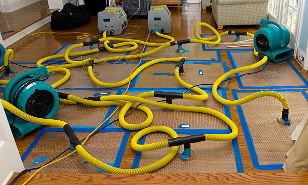 Professional Flood Damage Restoration technician working in Carrollton, OH